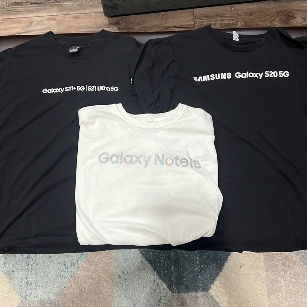Three promotional Samsung shirts black and white